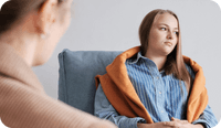 A therapist and her client discuss the various therapy interventions for depression