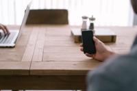 blog photo of person using iphone to represent security risks