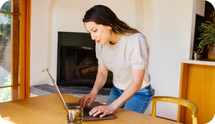 A female therapist uses her laptop to find out how to look up CPT codes