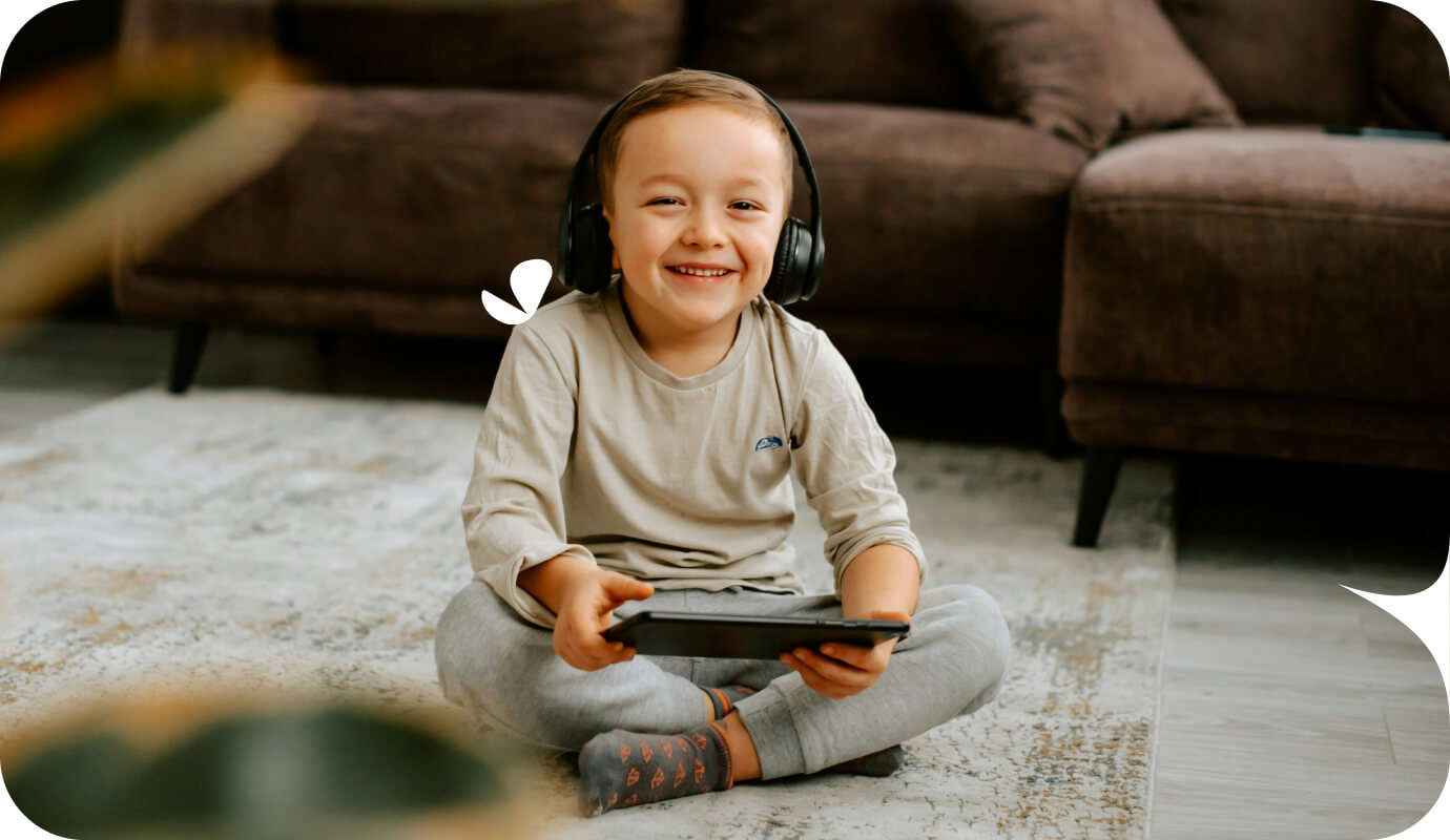 A young toddler uses apps for speech therapy for babies learning to talk