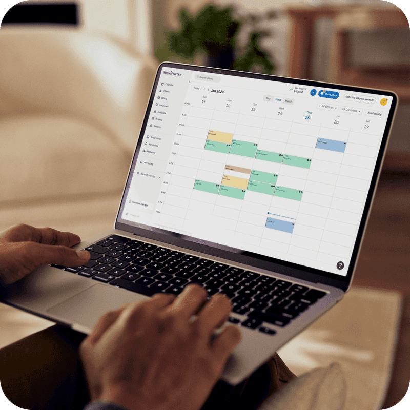 practitioner using simplepractice on a laptop