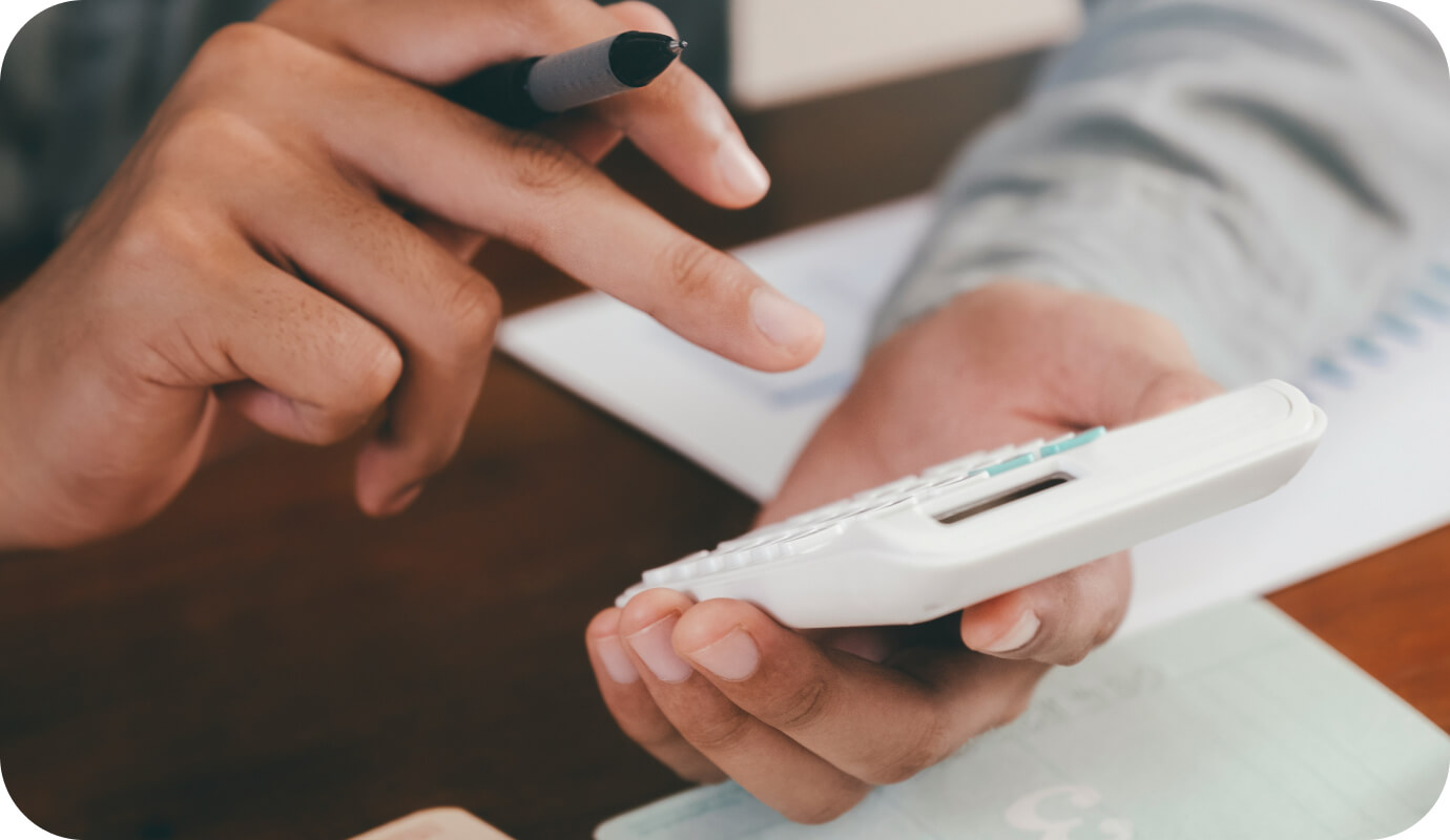 An occupational therapist uses a calculator to determine how many occupational therapy billing units to add to an insurance claim.